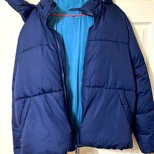 All in motion winter jacket. Made in Vietnam. Water resistant and wind resistant